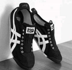 tiger slip on black white