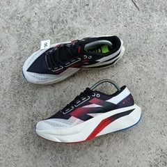 New Balance sc elite white black red